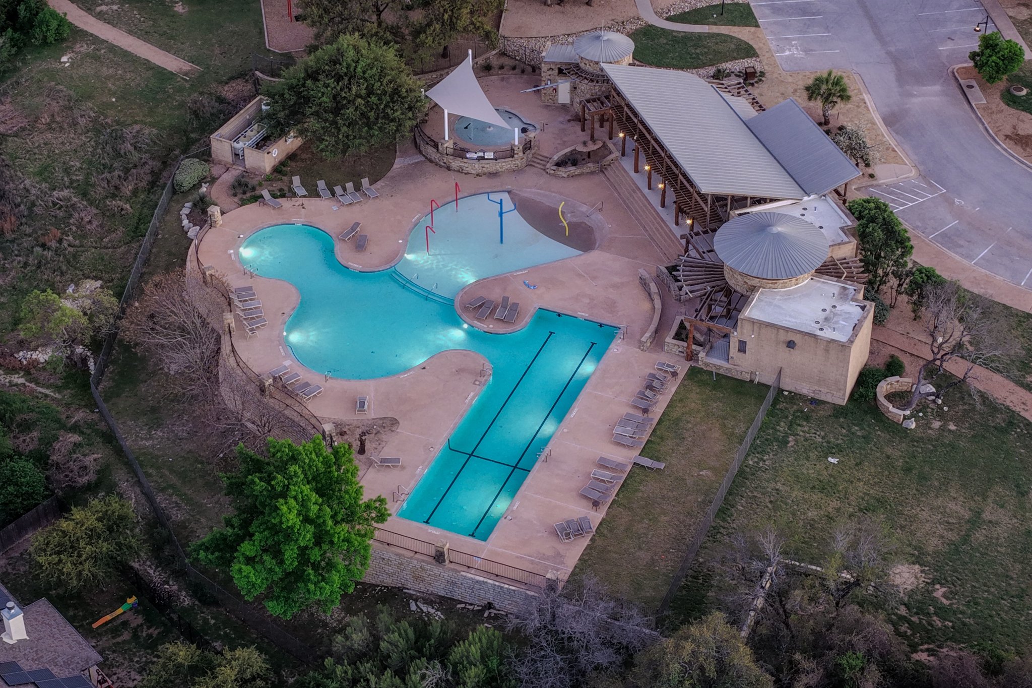 22204 Red Yucca Road Spicewood, TX 78669 - Photo 32 of 34 Drone / aerial view of a pool area
