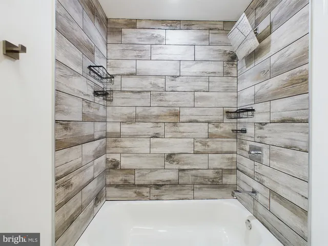 a bathroom with a bathtub