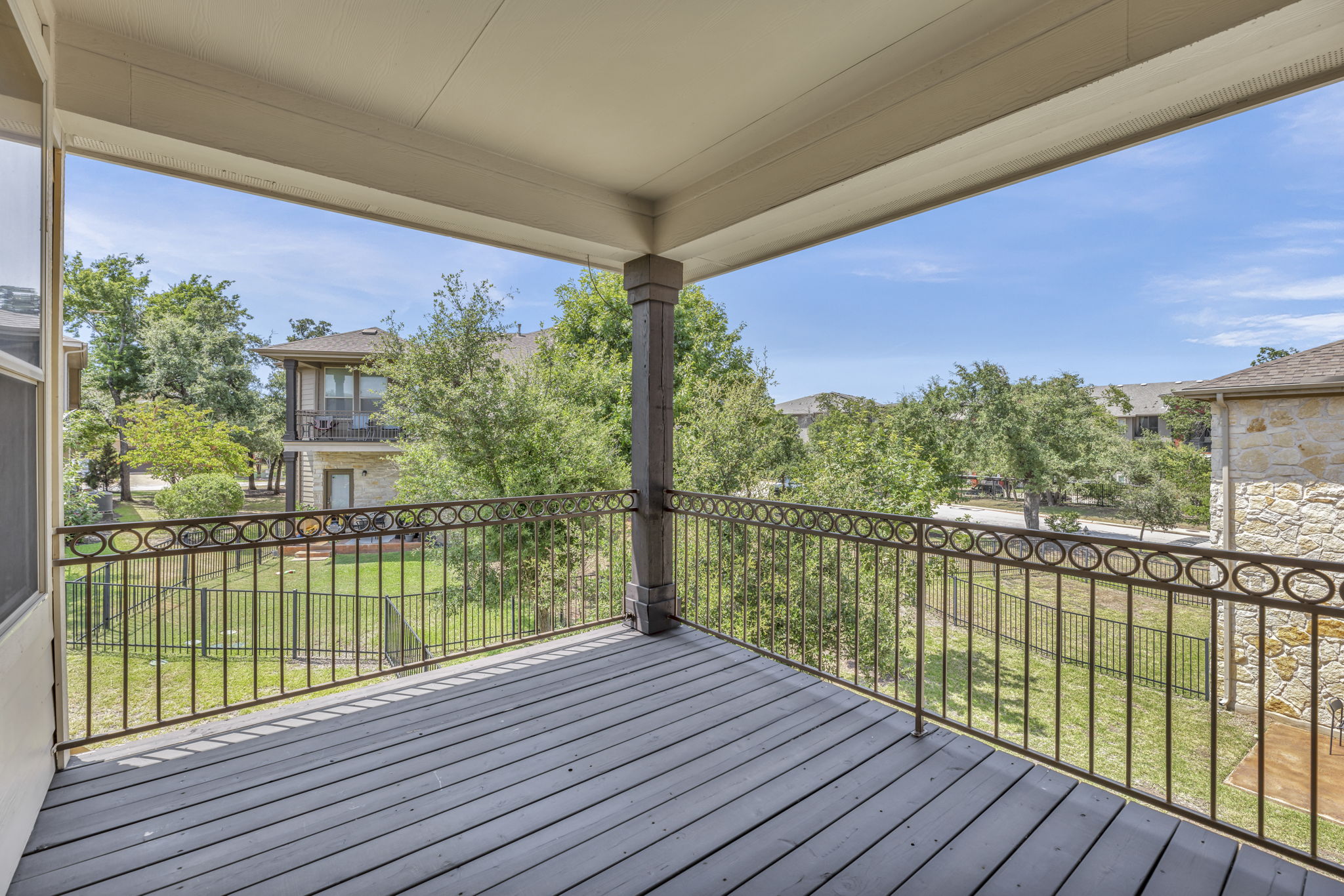 7320 Bandera Ranch Trail, Unit B Austin, TX 78750 - Photo 15 of 27 Wooden terrace featuring a yard