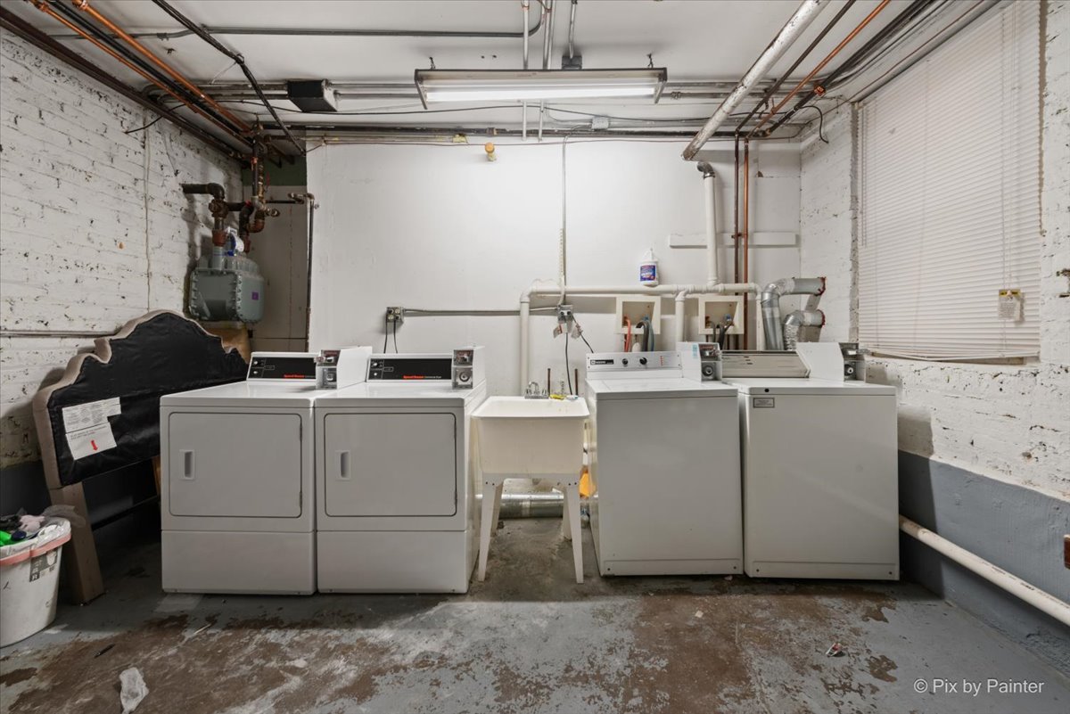 5428 North Campbell Avenue, Unit GS Chicago, IL 60625 - Photo 13 of 14 a room with storage and utility