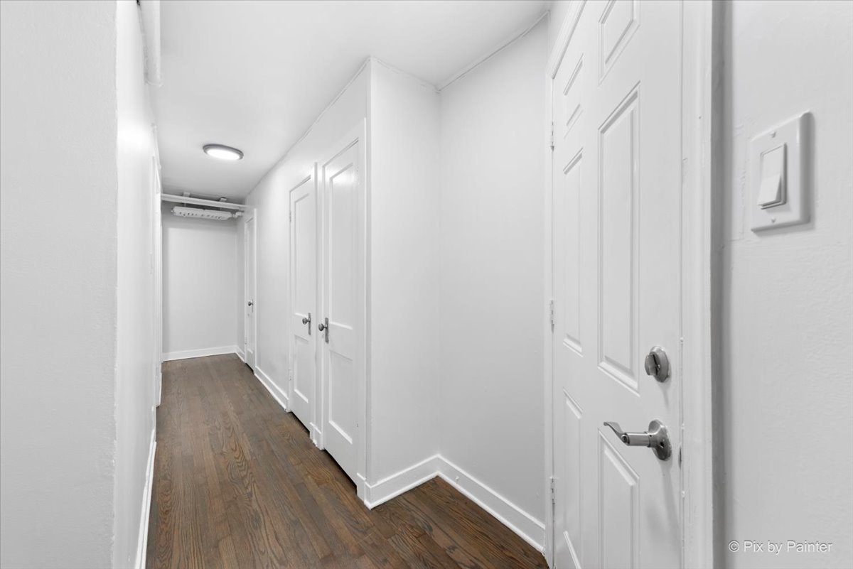 5428 North Campbell Avenue, Unit GS Chicago, IL 60625 - Photo 9 of 14 a view of a hallway with wooden floor