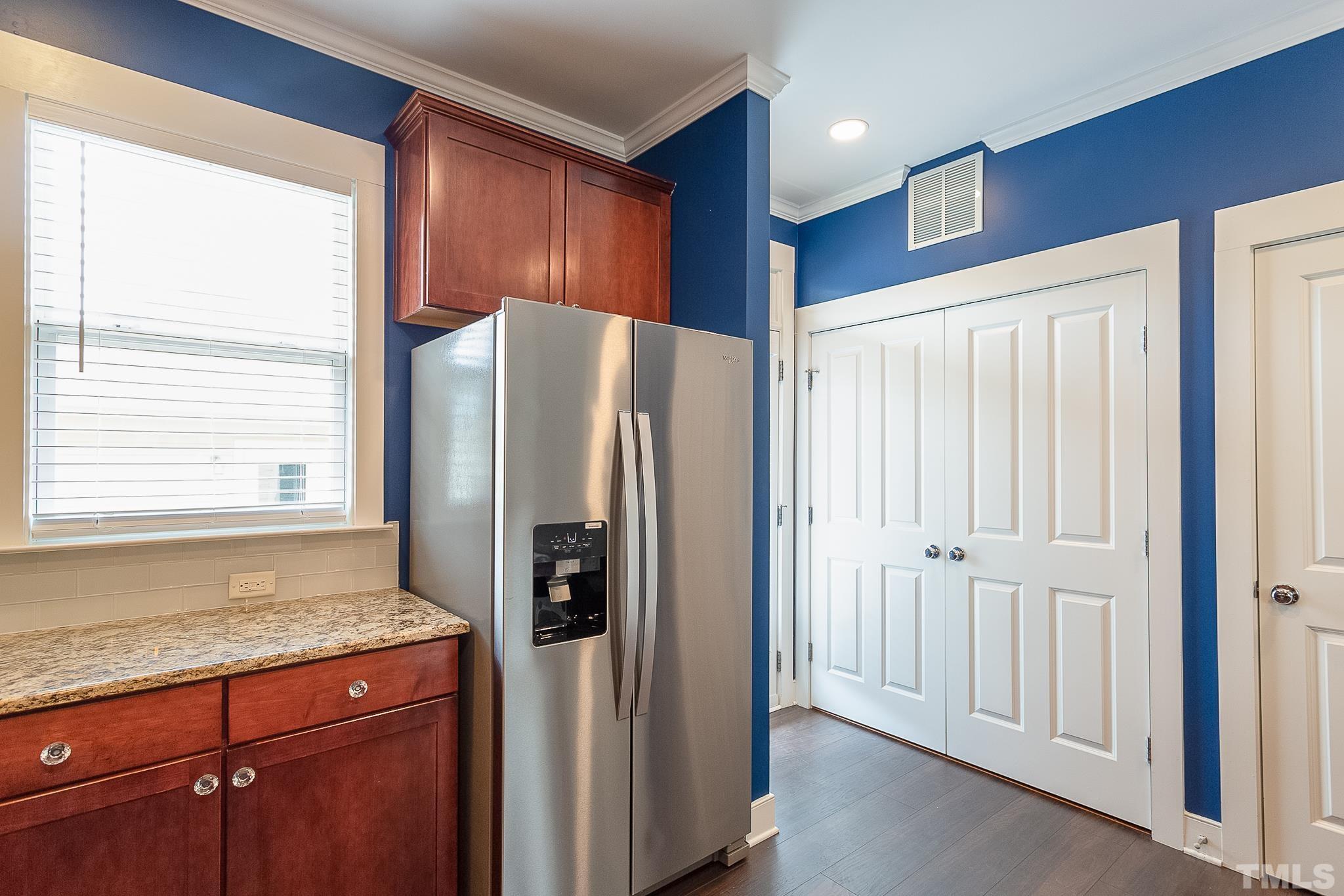 2262 Dunlin Lane Raleigh, NC 27614 - Photo 12 of 27 a kitchen with stainless steel appliances granite countertop a refrigerator and a sink