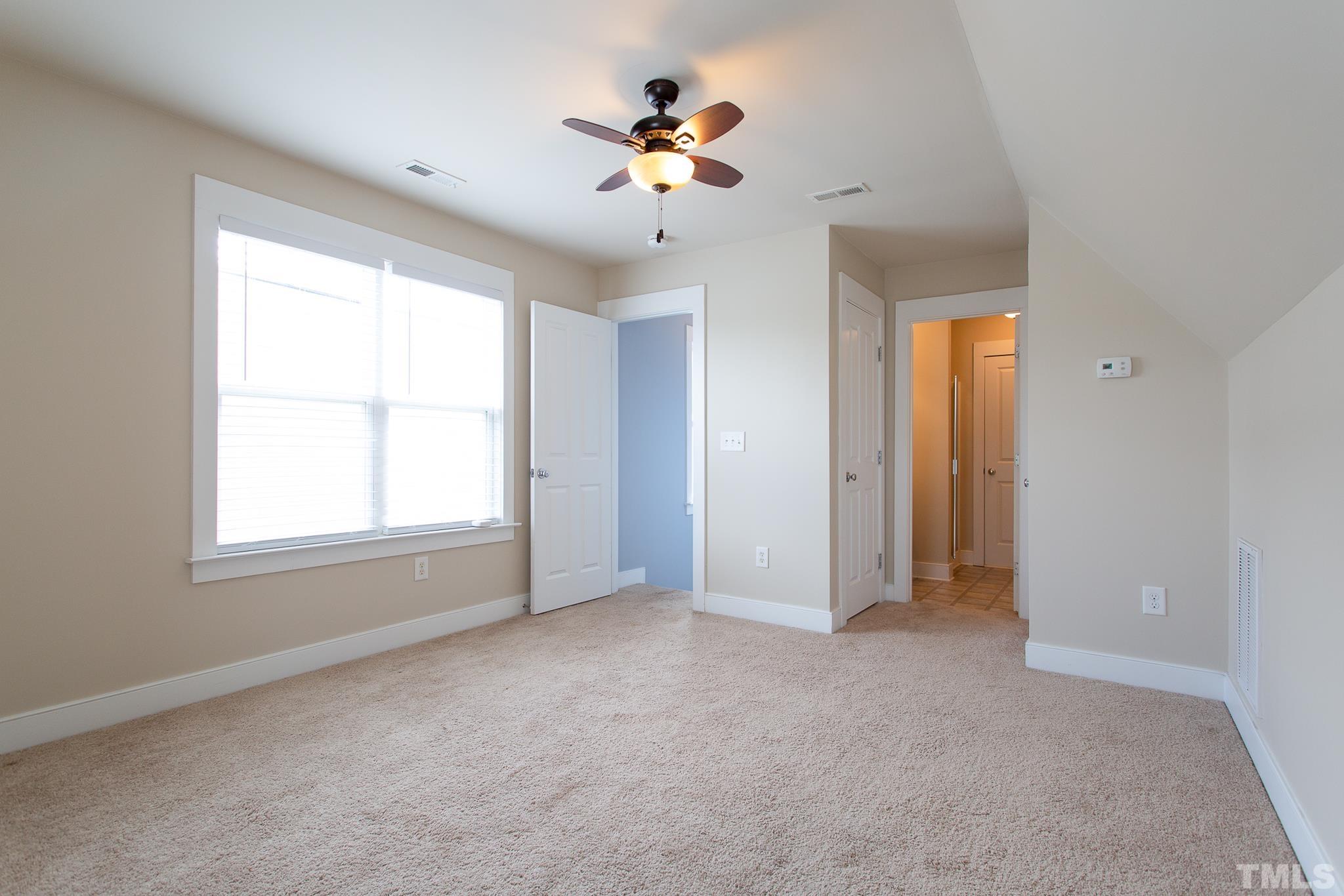 2262 Dunlin Lane Raleigh, NC 27614 - Photo 23 of 27 an empty room with fan and windows