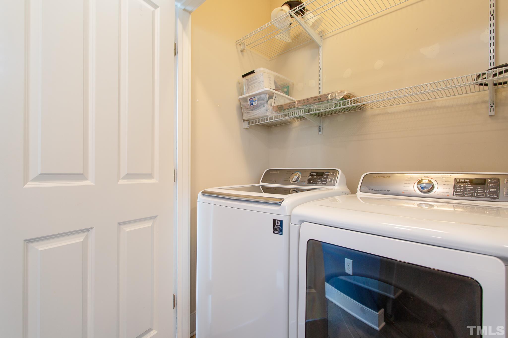 2262 Dunlin Lane Raleigh, NC 27614 - Photo 24 of 27 a utility room with dryer and washer