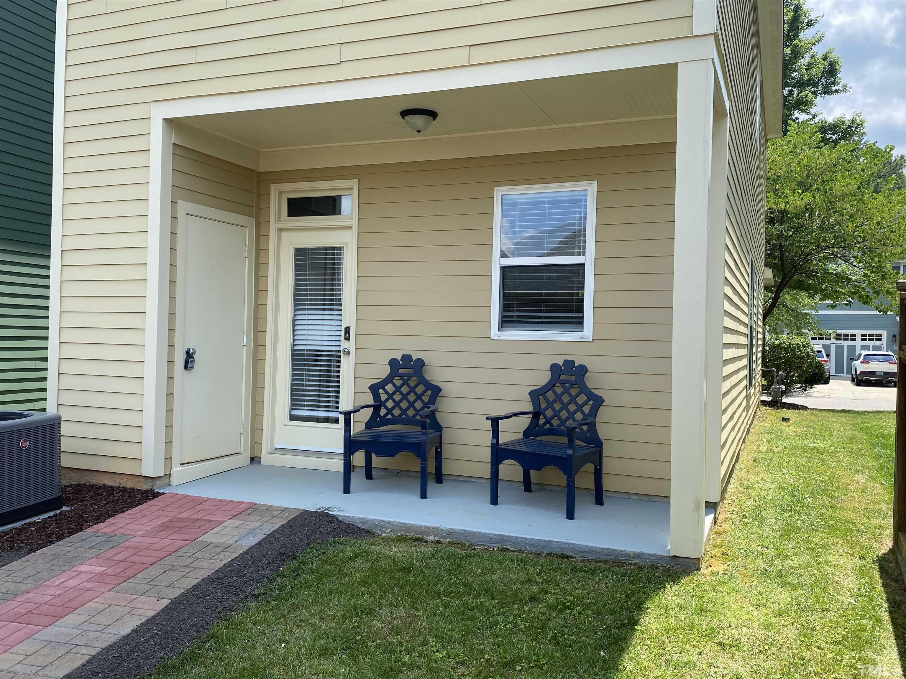2262 Dunlin Lane Raleigh, NC 27614 - Photo 25 of 27 a backyard view with a chair and table