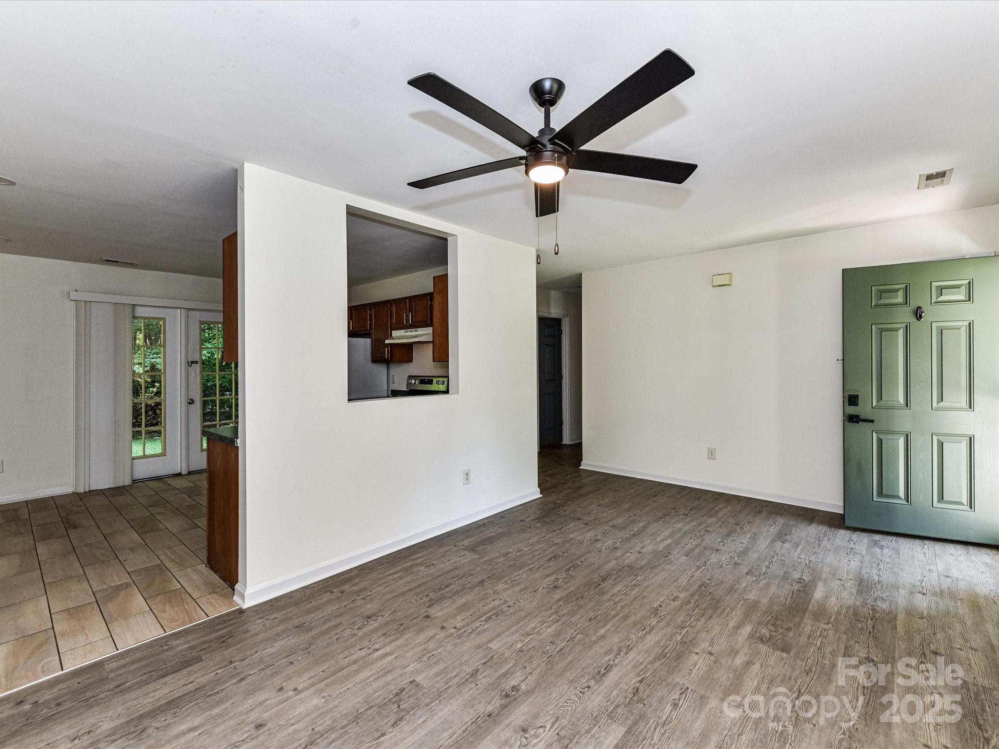 12224 Lullingstone Road Pineville, NC 28134 - Photo 5 of 26 wooden floor in an empty room
