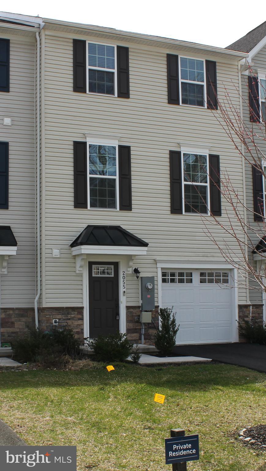 2055 Rivers Drive Newark, DE 19702 - Photo 1 of 32 a front view of a house with a yard