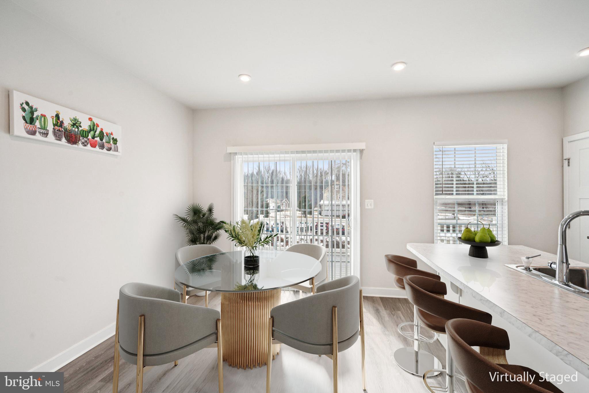 2055 Rivers Drive Newark, DE 19702 - Photo 15 of 32 a dining room with furniture and window