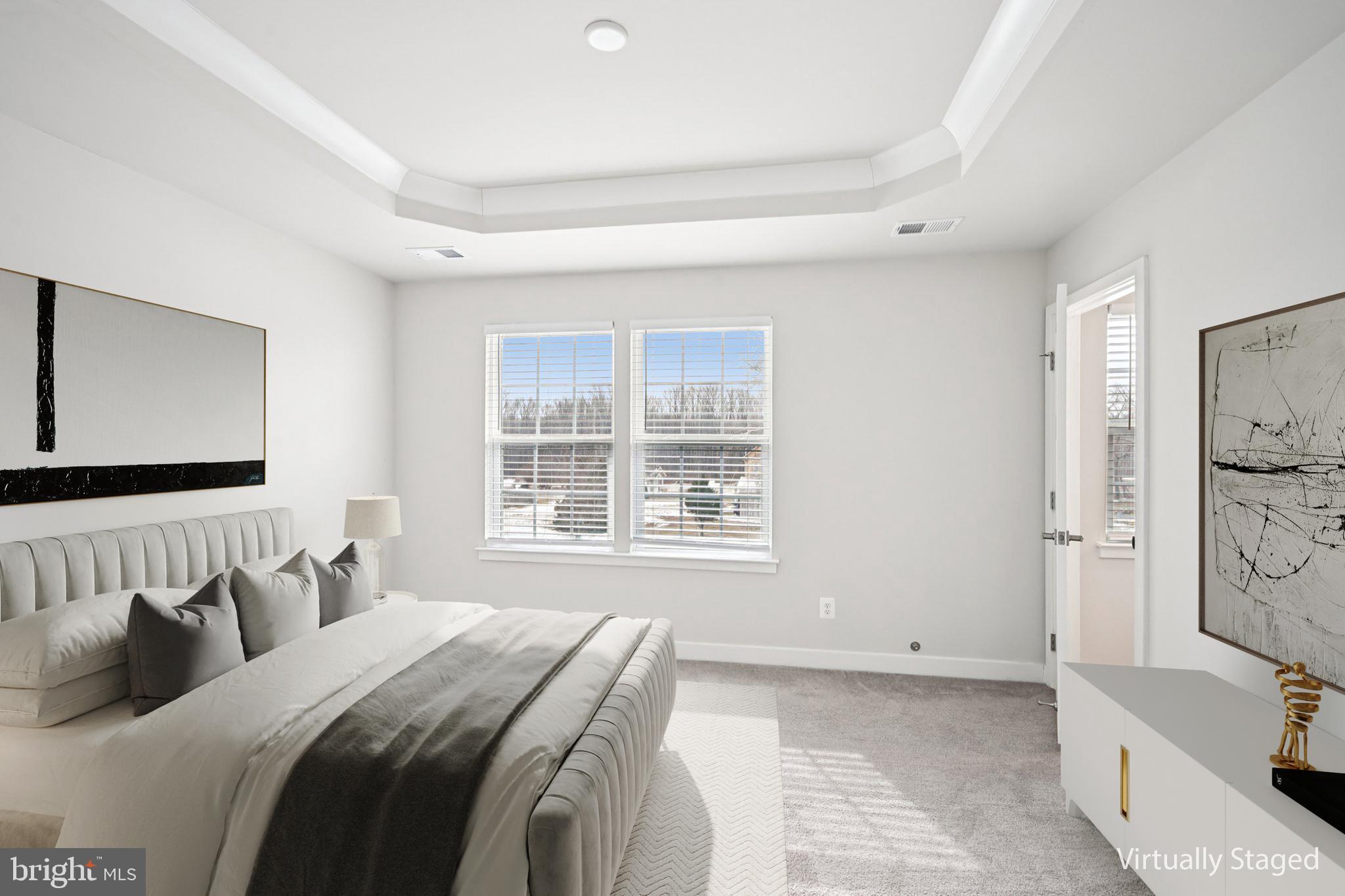 2055 Rivers Drive Newark, DE 19702 - Photo 18 of 32 a bedroom with a bed and a large mirror