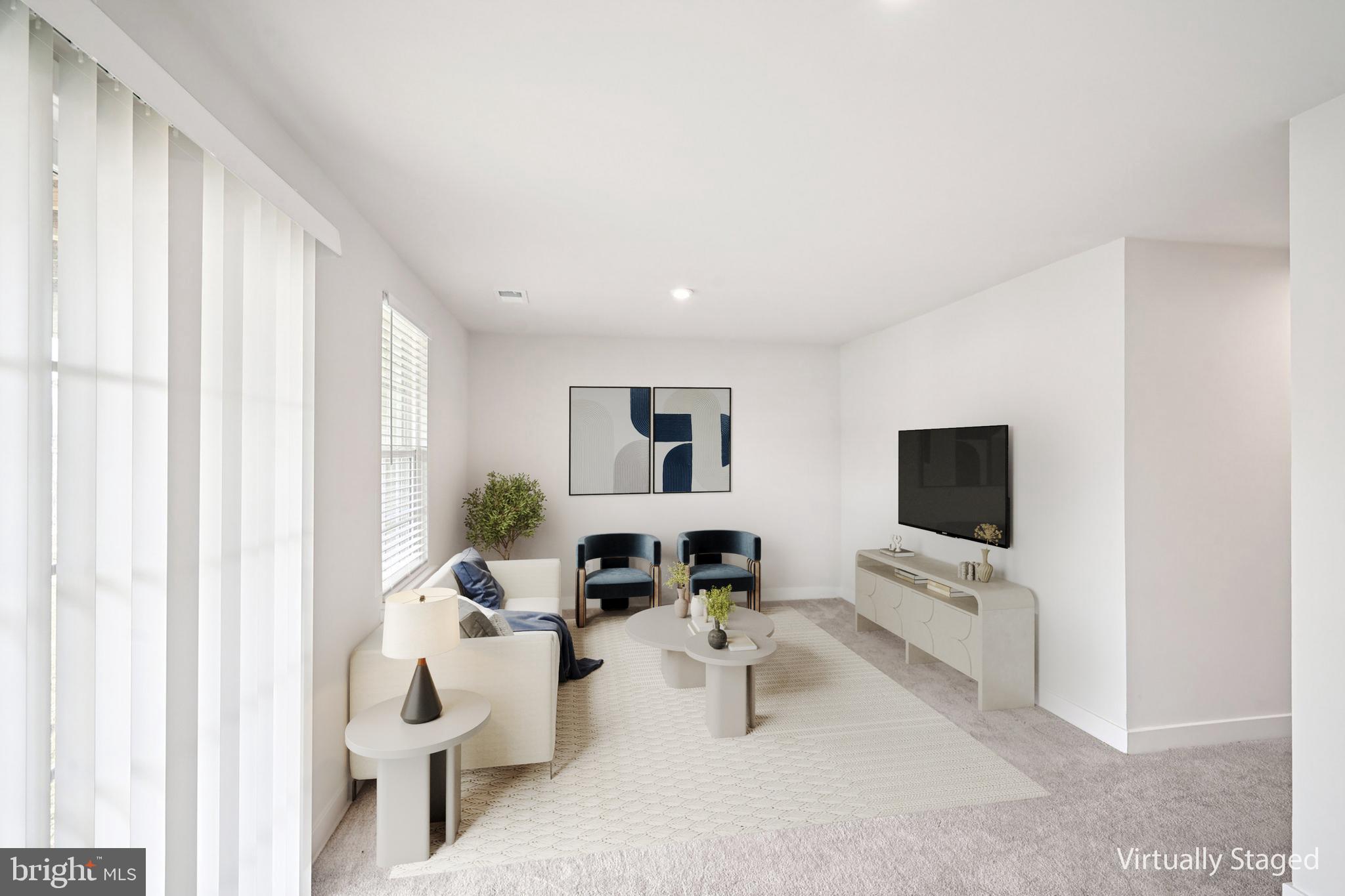 2055 Rivers Drive Newark, DE 19702 - Photo 27 of 32 a living room with furniture and a flat screen tv