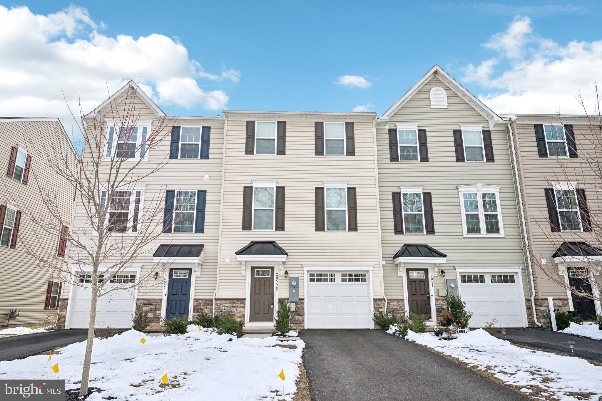 2055 Rivers Drive Newark, DE 19702 - Photo 3 of 32 a front view of a building with a street