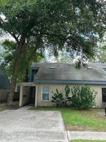 a view of a house with a garden