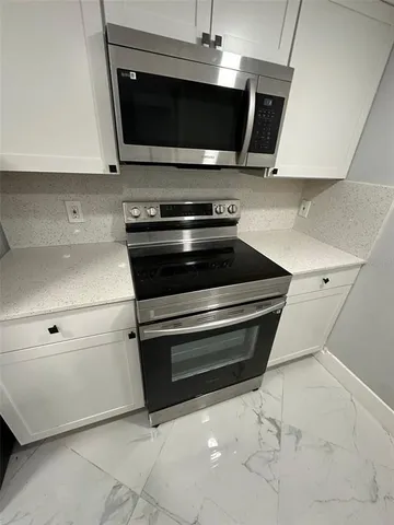 a view of hallway with an empty space