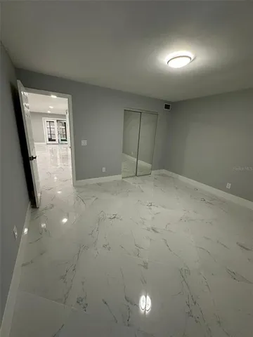 a kitchen with stainless steel appliances a refrigerator and a sink