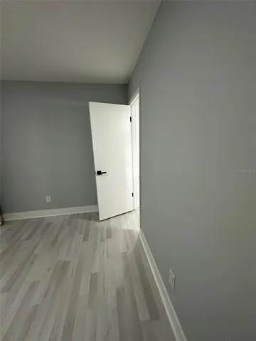 a kitchen with stainless steel appliances a stove microwave and refrigerator