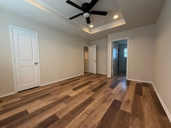 a view of a livingroom with a hardwood floor