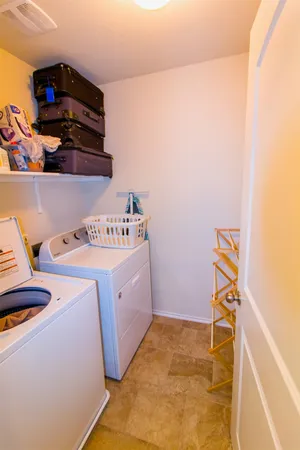 a bedroom with a bed and cabinets