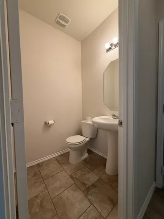 a bathroom with a toilet