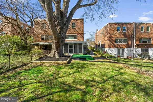 a view of a backyard with a garden