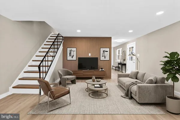 wooden floor in an empty room with stairs