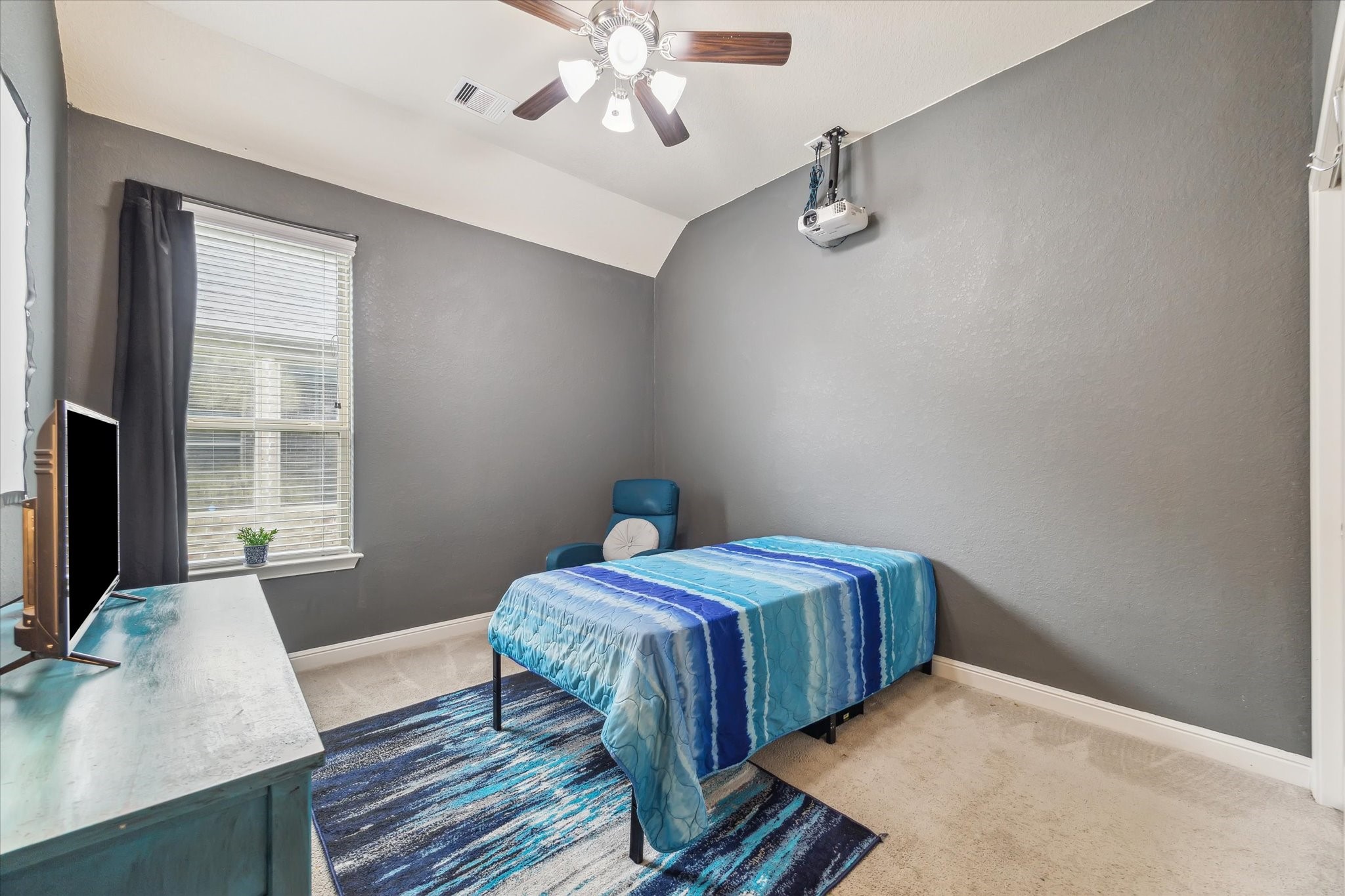 4914 Mountain Maple Trail Rosenberg, TX 77471 - Photo 22 of 24 Versatile secondary room currently set up as a media space ideal for a home theater, office, or guest room.