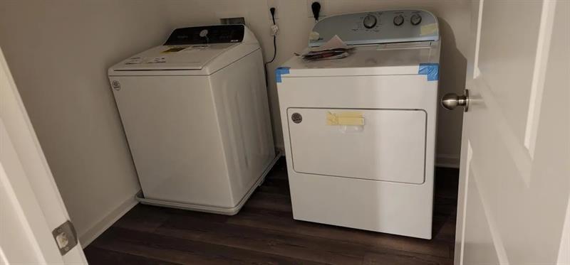 228 Banner Road Pendergrass, GA 30567 - Photo 6 of 8 a utility room with dryer and washer