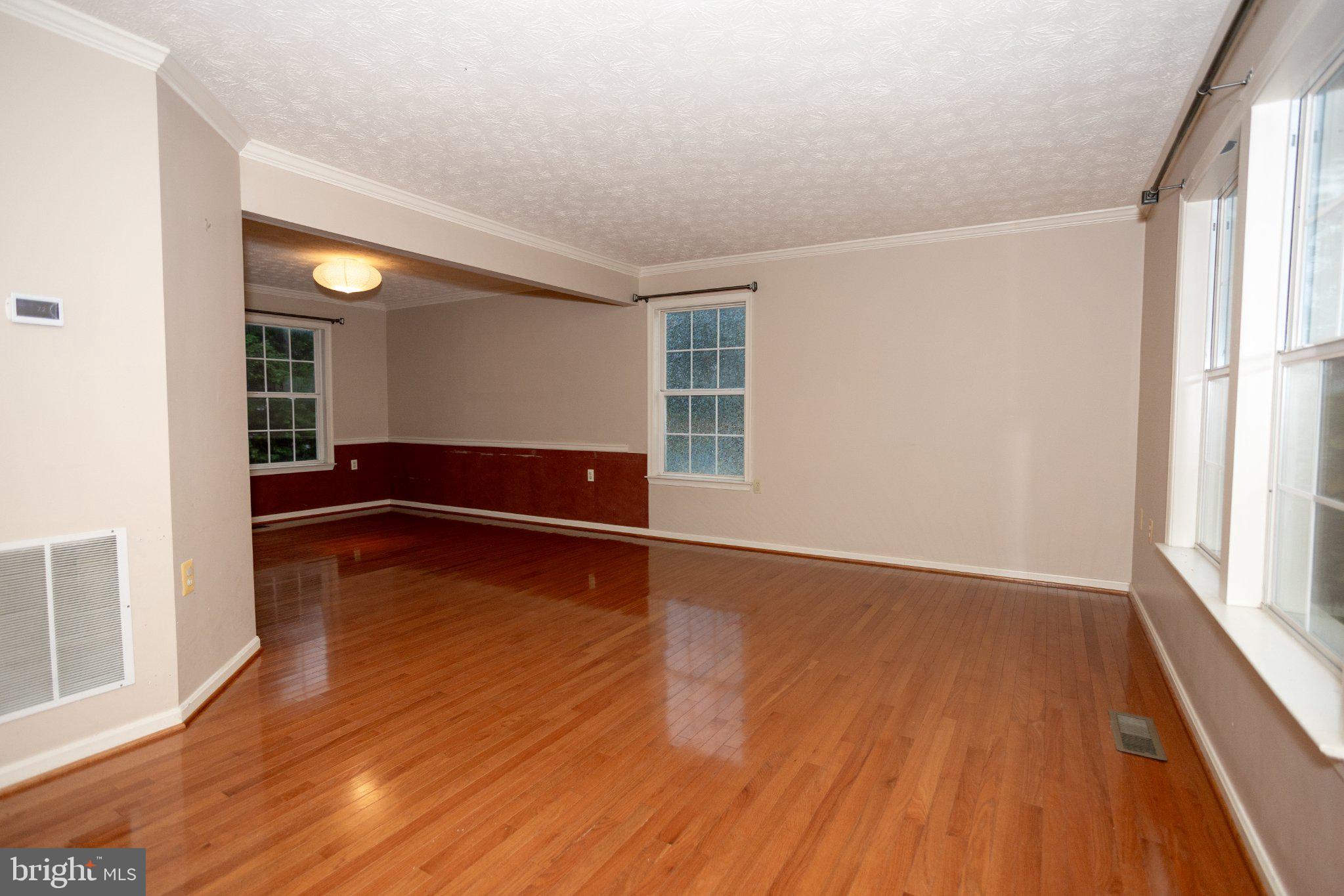 10412 Labrador Loop Manassas, VA 20112 - Photo 25 of 58 Spacious room with warm wood floors.