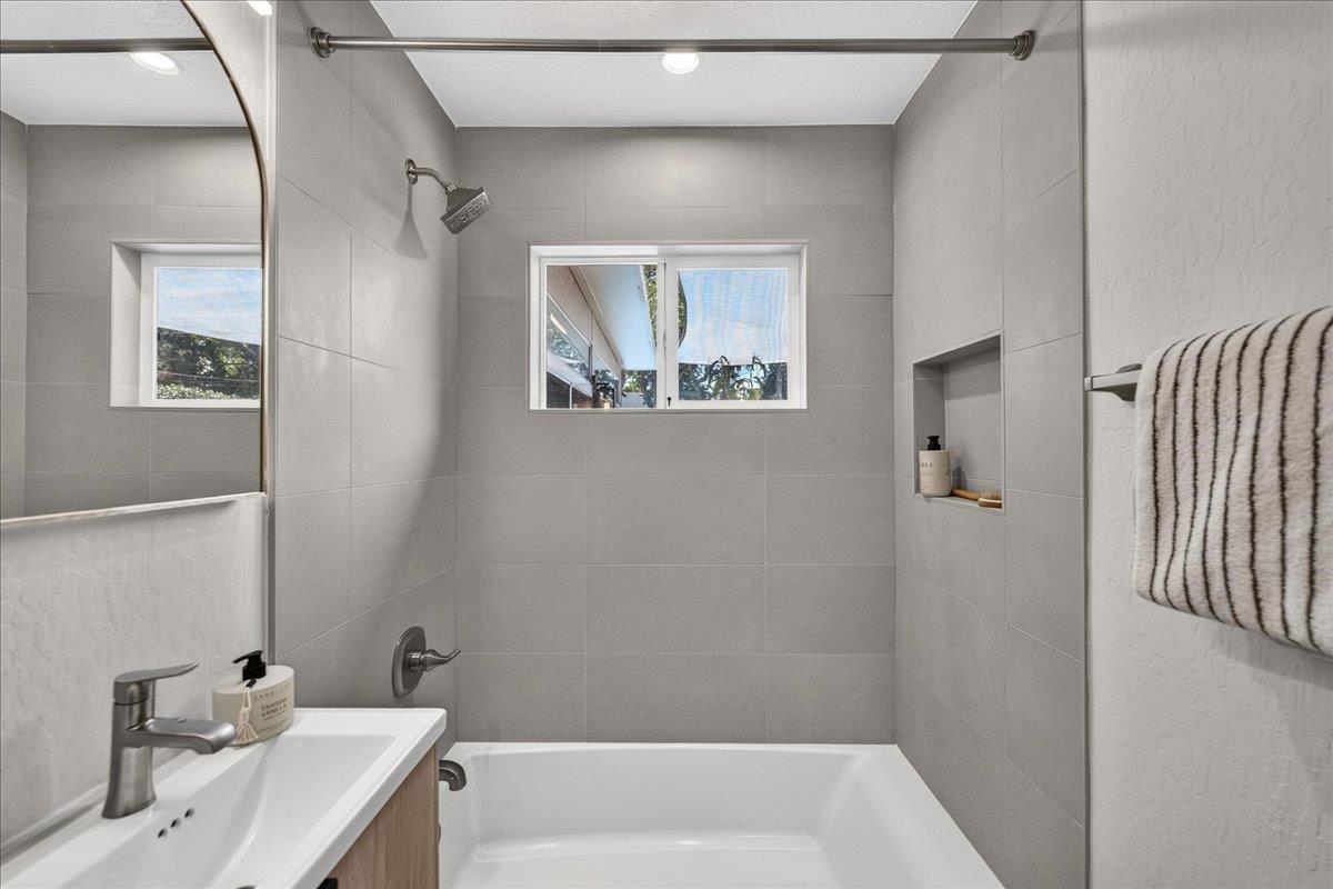 2130 Roenoke Way San Jose, CA 95128 - Photo 16 of 33 a bathroom with a bathtub and a sink