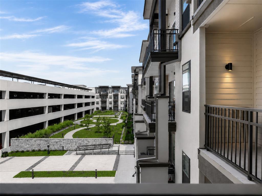 2700 Old Denton Road, Unit 3370 Carrollton, TX 75007 - Photo 25 of 35 a view of street with tall buildings
