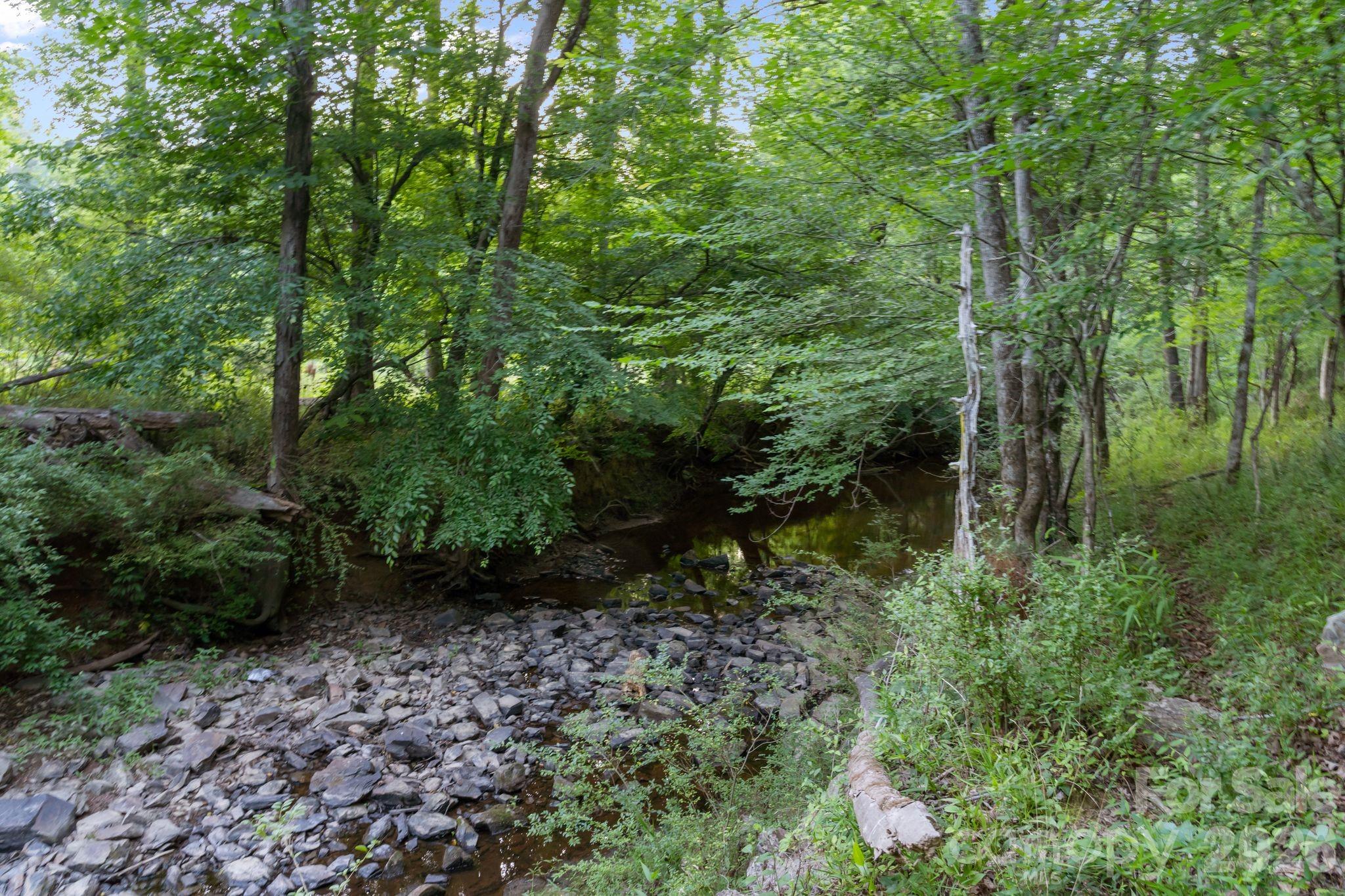 0 Lucy Short Cut Road, Unit 2 Marshville, NC 28103 - Photo 23 of 38 a big yard with lots of green space and trees
