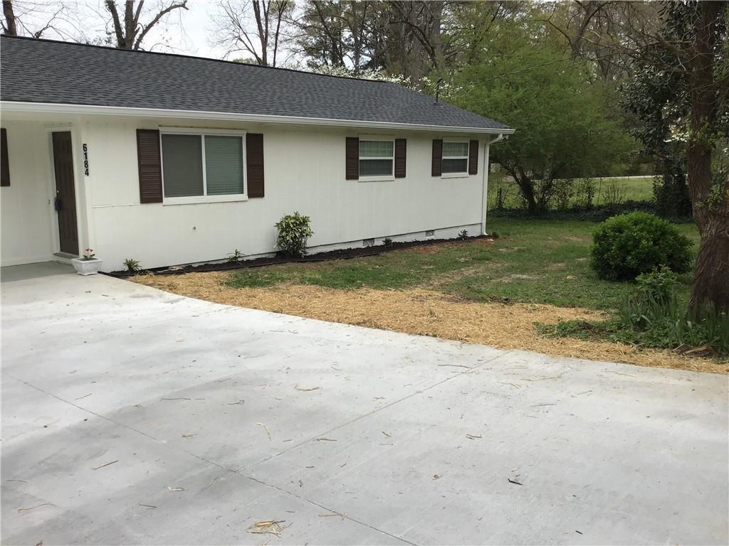 6184 Geiger Street Northwest Covington, GA 30014 - Photo 3 of 16 a view of outdoor space and yard