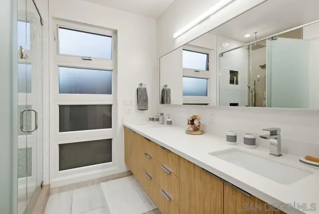 a stove top oven sitting inside of a kitchen
