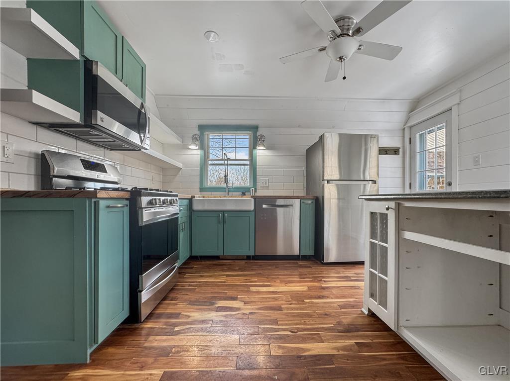 3213 Center Street Bethlehem, PA 18017 - Photo 12 of 38 a kitchen with stainless steel appliances granite countertop a refrigerator a stove and a sink