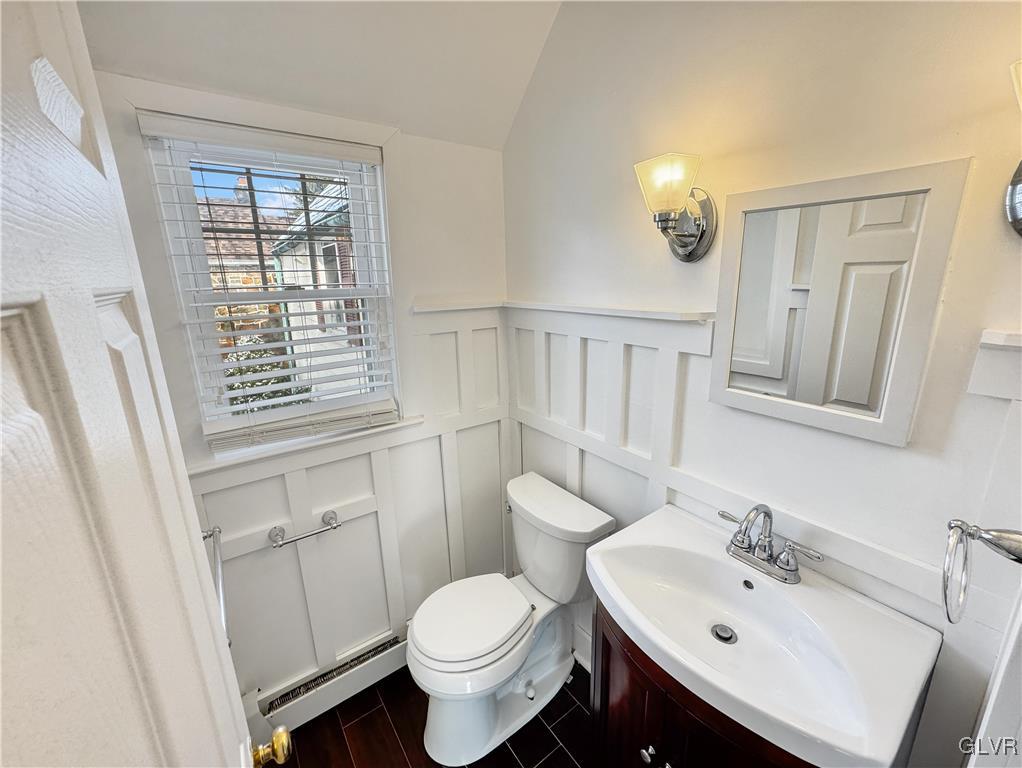 3213 Center Street Bethlehem, PA 18017 - Photo 16 of 38 a bathroom with a sink toilet and mirror