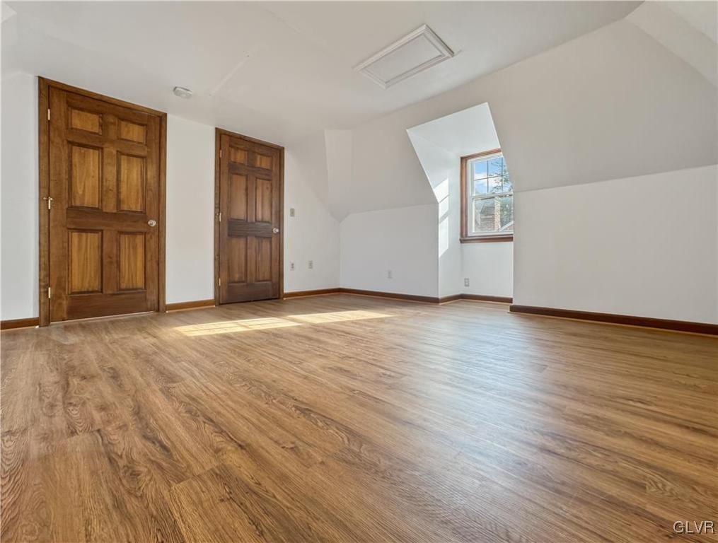 3213 Center Street Bethlehem, PA 18017 - Photo 18 of 38 an empty room with wooden floor and windows