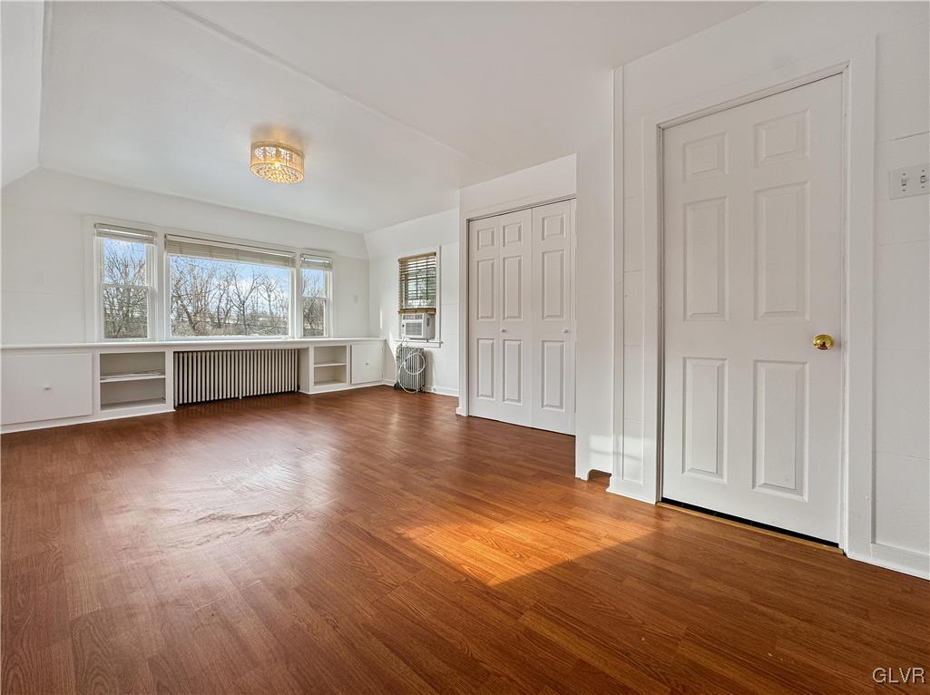 3213 Center Street Bethlehem, PA 18017 - Photo 21 of 38 an empty room with wooden floor and windows