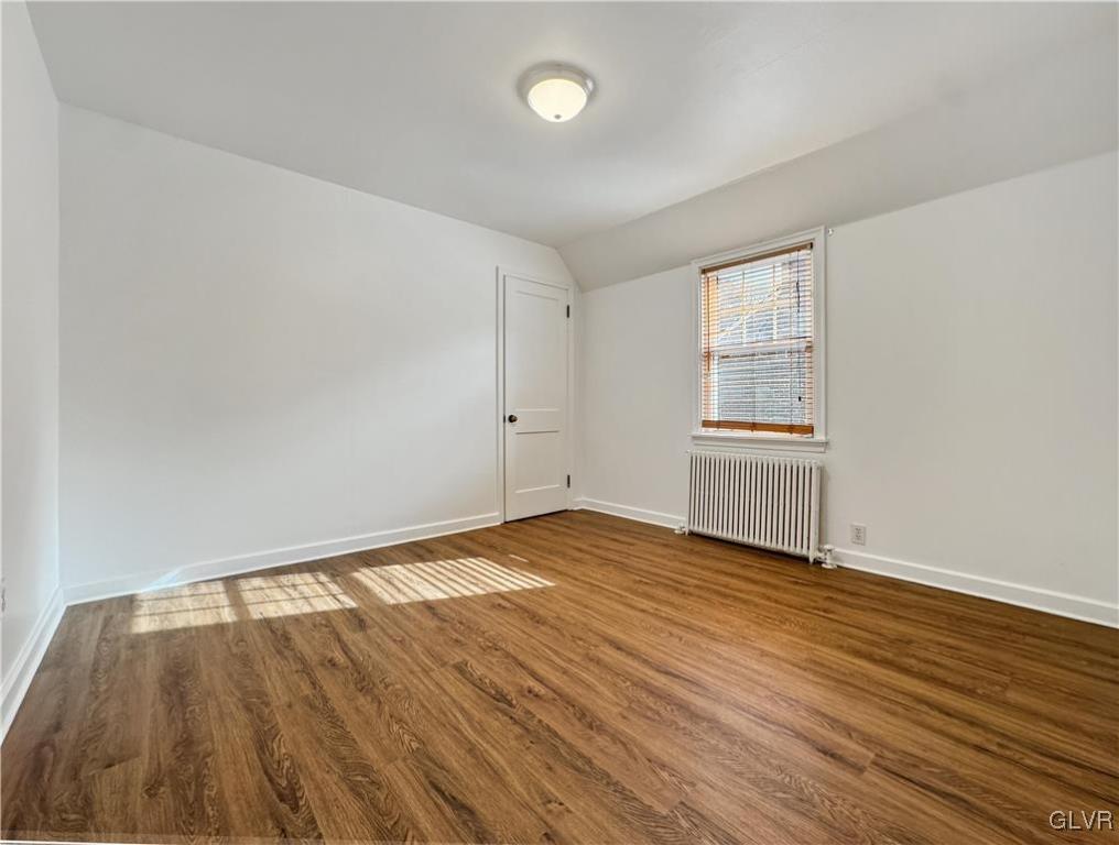 3213 Center Street Bethlehem, PA 18017 - Photo 24 of 38 an empty room with wooden floor and windows