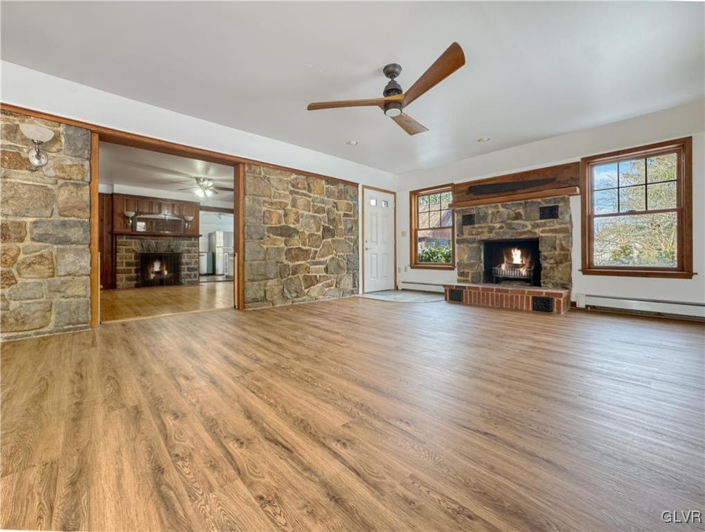 3213 Center Street Bethlehem, PA 18017 - Photo 6 of 38 wooden floor in an empty room with a fireplace