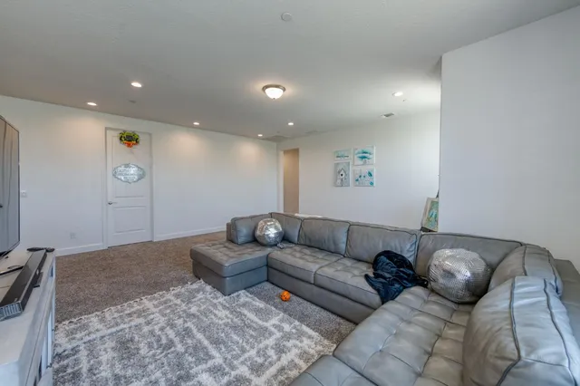 a living room with furniture and a couch