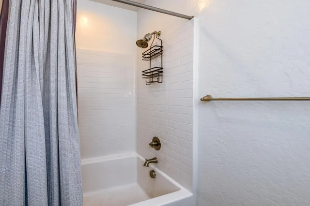 a bathroom with a bathtub