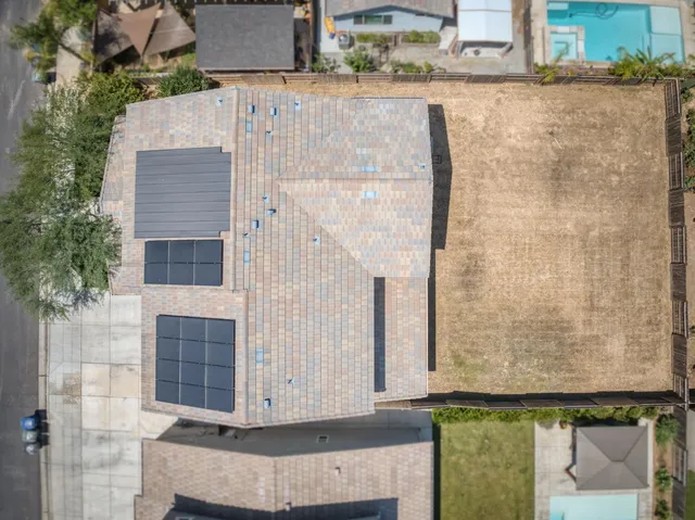 closeup of a bathroom with a shower and a sink