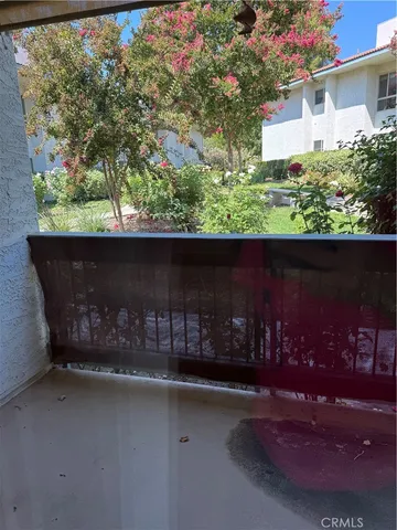 a view of a terrace with chairs