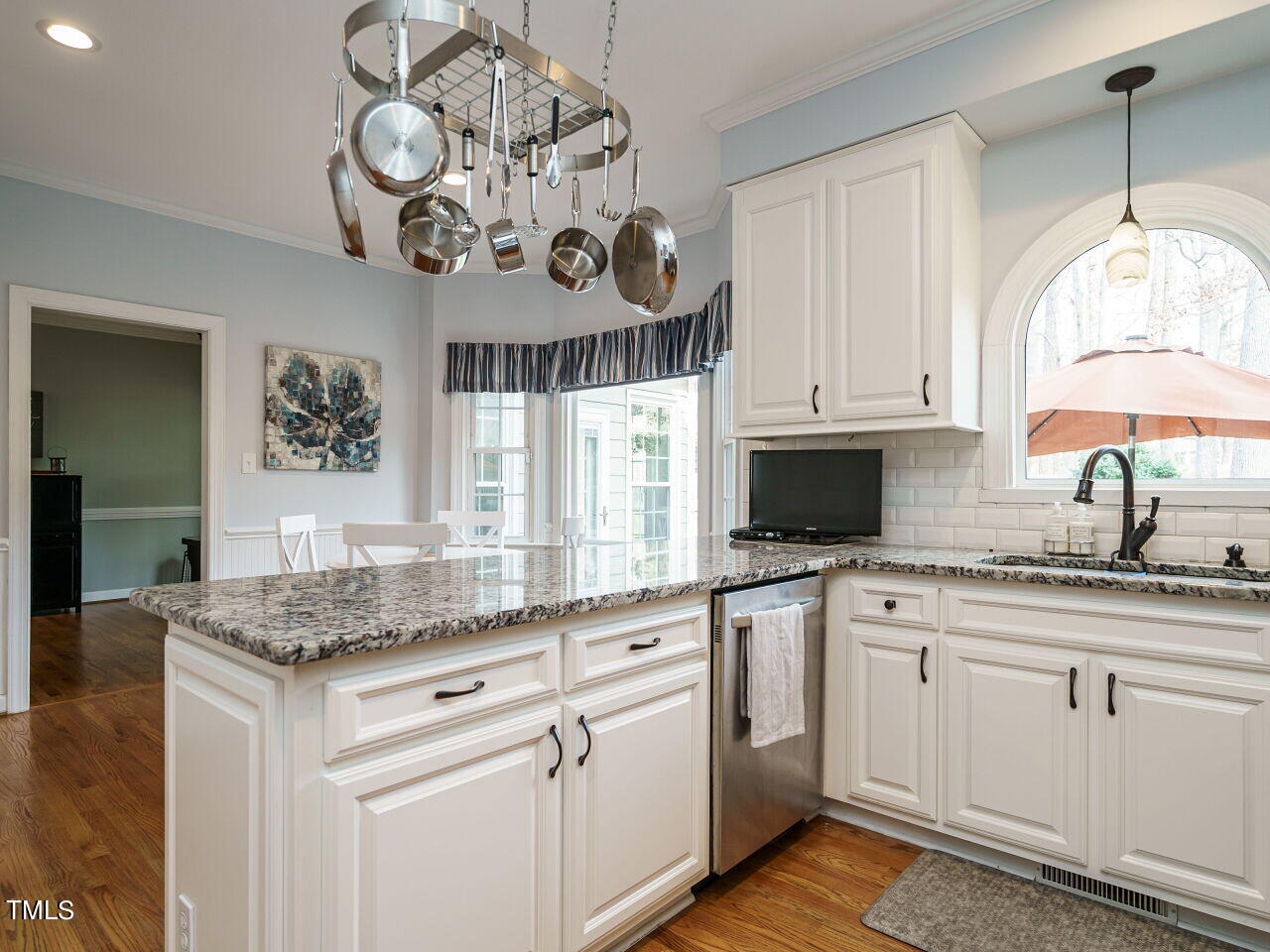 220 Custer Trail Cary, NC 27513 - Photo 14 of 31 a kitchen with cabinets and window