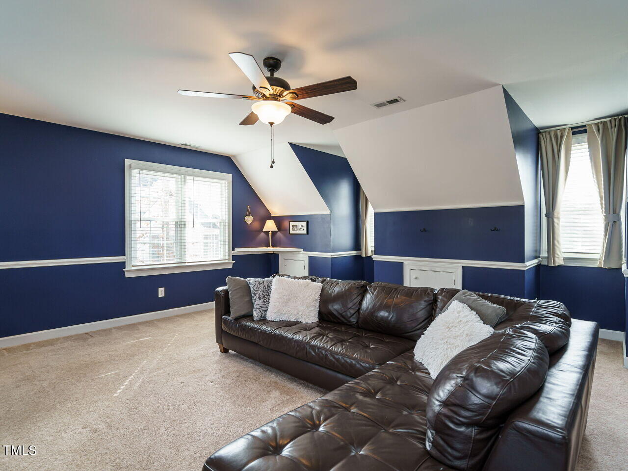 220 Custer Trail Cary, NC 27513 - Photo 19 of 31 a living room with furniture and a window