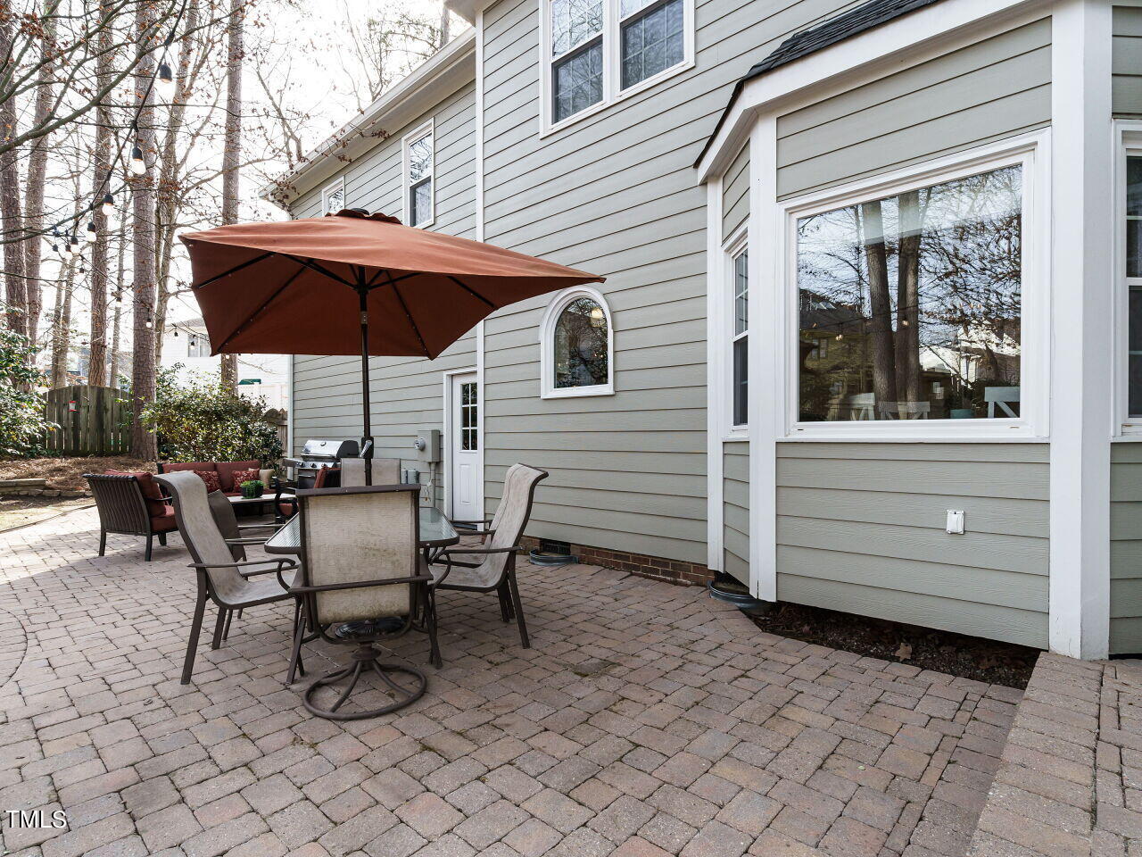 220 Custer Trail Cary, NC 27513 - Photo 27 of 31 a view of a house with backyard and sitting area