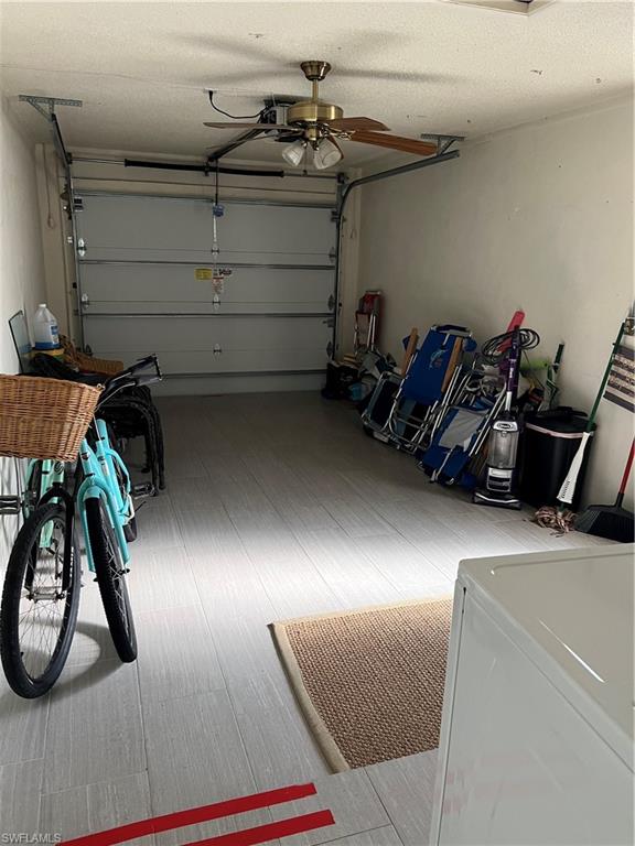 671 100th Avenue North Naples, FL 34108 - Photo 14 of 16 Garage featuring ceiling fan