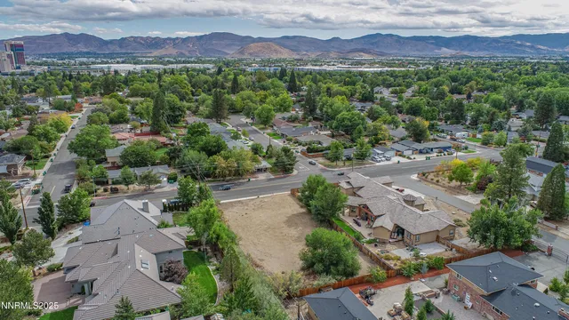 an aerial view of residential house with outdoor space