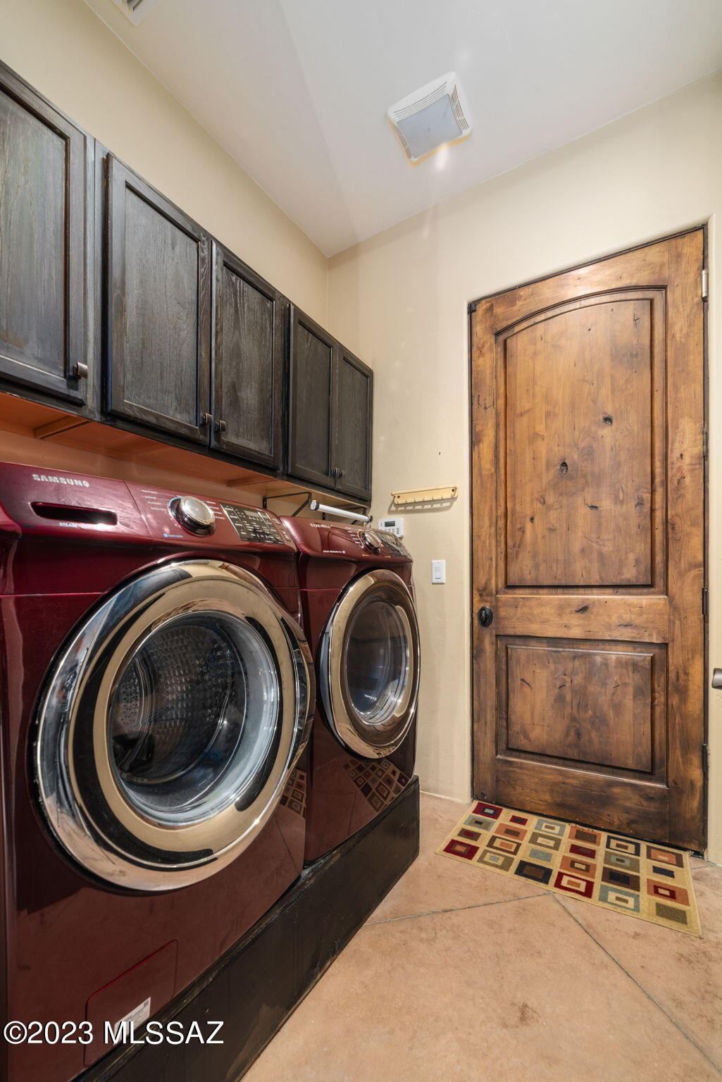 5670 Triangle X Place Tucson, AZ 85713 - Photo 28 of 36 a utility room with sink dryer and washer