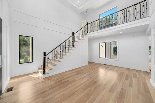 a view of entryway with wooden floor