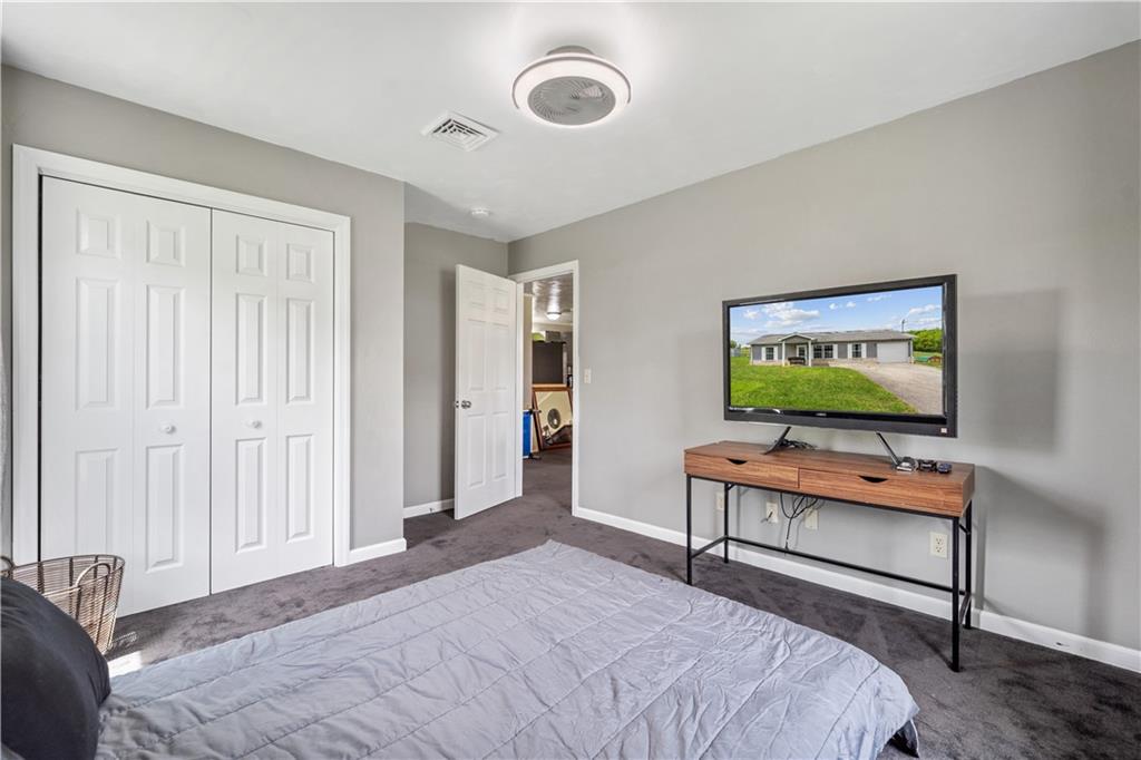 2109 Ridge Boulevard Connellsville, PA 15425 - Photo 11 of 22 a living room with furniture and a flat screen tv